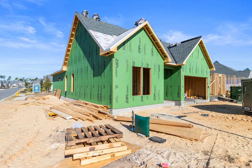 Welcome to the Colt XL by Huff Homes, located in the Longleaf Park neighborhood of Watersound Origins with an estimated completion at the end of April 2026. This single-level home offers approximately 1,940 square feet of living space, with 3 bedrooms, 2 full baths, and a 2-car garage. The XL version features an expanded living room and dining area, providing additional space for everyday living and entertaining.The kitchen includes a quartz countertops, 10 ft island with extra storage cabinets under the overhang, upgraded stainless steel Bosch appliance package with gas range, soft-close cabinetry, and a tile backsplash, and opens directly to the larger living and dining areas. The main living spaces feature 10-foot ceilings, crown molding, and luxury vinyl plank flooring. The Owner's Suite includes a custom walk-in closet and private bath with a tiled shower and quartz vanity. Two additional bedrooms and a full bath offer flexibility for guests or a home office.

A screened rear porch extends the living space outdoors. Additional features include energy-efficient construction, professional landscaping with irrigation, and a 2-car garage.

Located within Watersound Origins, residents have access to the Origins Golf Course, Village Commons pool, fitness center, sports courts, trails, and Watersound Town Center, all within the community.