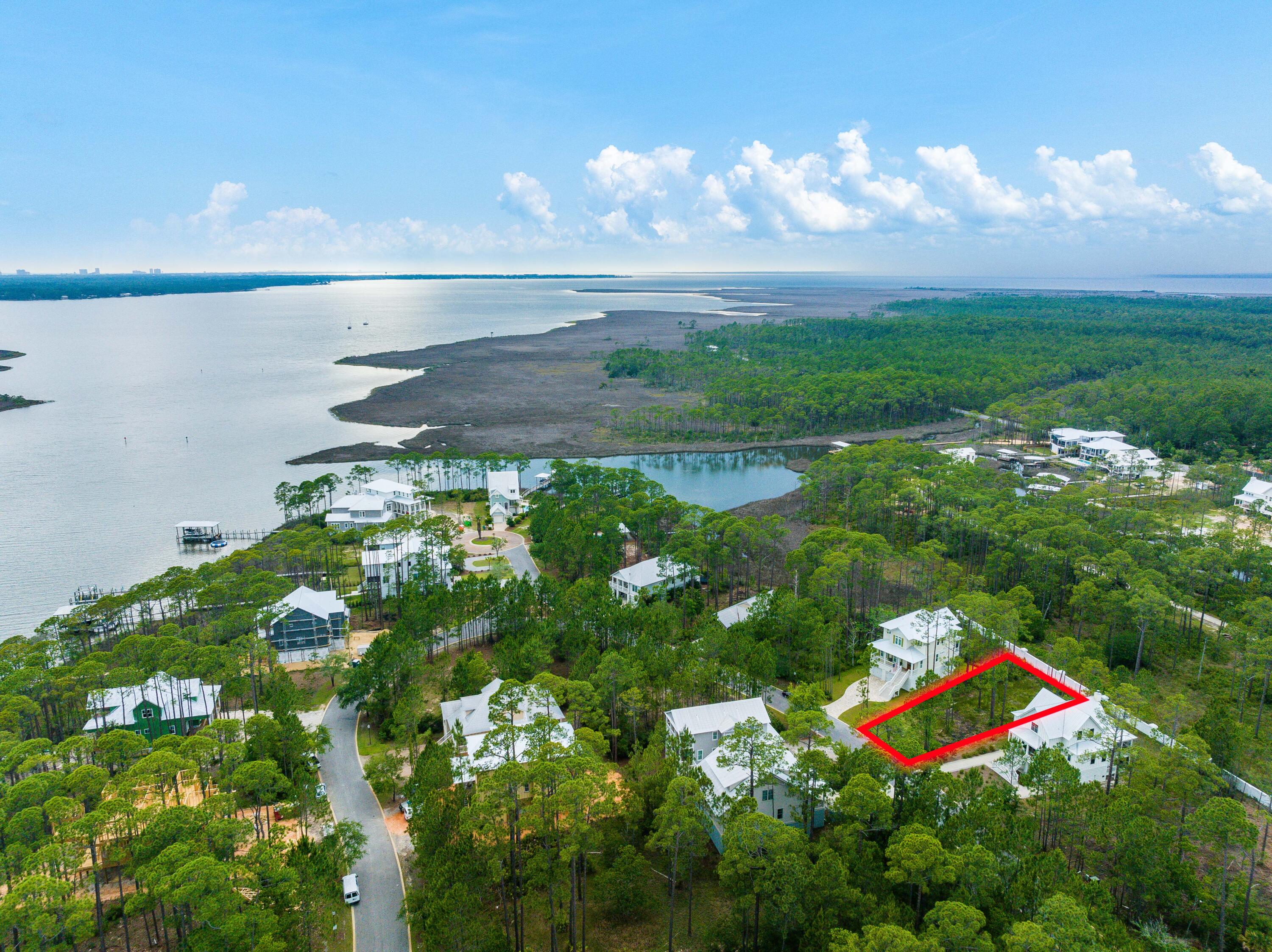 Welcome to Cessna Landing, where serenity meets bayfront living! This magnificent quarter-acre lot offers an exceptional opportunity to build your dream home in a quiet, gated community nestled along the pristine shores of Choctawhatchee Bay.As you enter Cessna Landing, you'll immediately notice the well-kept surroundings, showcasing the community's commitment to maintaining its beauty. This sought-after neighborhood boasts newer construction homes, ensuring that your investment will be surrounded by contemporary designs and modern aesthetics.Enjoy the delightful amenities that Cessna Landing has to offer. Take a refreshing dip in the community pool on those warm summer days or head down to the private dock, providing direct access to the breathtaking Choctawhatchee Bay. Whether you're an avid boater or simply love waterfront activities, this bayfront community is perfect for water enthusiasts of all kinds.
Cessna Landing also places high importance on maintaining the peaceful ambiance of the neighborhood. Short-term rental restrictions ensure that the tranquility of the community is preserved, allowing you to fully immerse yourself in the peaceful surroundings.
With a convenient location near the Cessna Landing boat launch, you'll have easy access to exploring the beauty of the bay at your leisure. Furthermore, just a short drive away are the numerous beach accesses on the west end of 30A, providing endless opportunities to soak up the sun and enjoy the pristine white sands that this area is renowned for.
In addition to its stunning location, Cessna Landing offers a sense of security with its gated entrance, ensuring your privacy and peace of mind. Homeowners in this community contribute $500 per quarter in HOA dues, which go towards maintaining the community's amenities and overall upkeep.
Don't miss your chance to own this extraordinary quarter-acre lot in Cessna Landing, an idyllic bayfront community with newer construction homes, short-term rental restrictions, and a host of desirable amenities. Build your ideal home in this tranquil oasis and start living the life you've always dreamed of.