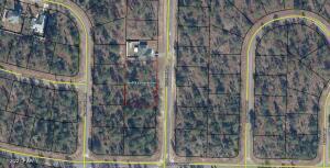 .52 Acres +/- in Sunny Hills. Two parcels combine to make this beautiful track of land (Lots 13 & 14). Call to schedule your showing today.
