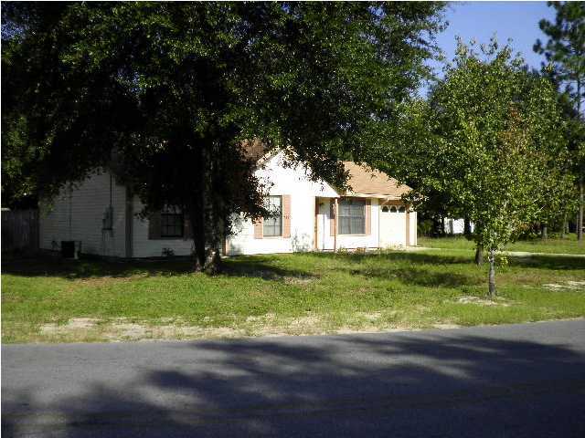 Privacy Fenced Yard! Call today to see this 3BR/2BA house on corner lot, living room with corner fireplace, kitchen, dining area, master bedroom w/ tray ceiling, two additional bedrooms and two baths. Nice level lot, privacy fenced back yard, storage shed and garage. Owner will consider a small pet.