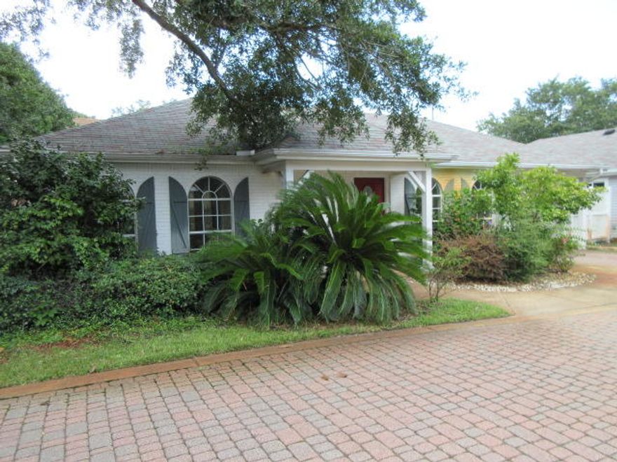 This one is so cute! This 2 bedroom, 2 bath REO Villa style townhome is adorable in a charming small community in Destin that is so close to the Bay. The home features a fireplace, breakfast bar, cathedral ceiling, separate storage closet and a carport for covered parking. The location is so convenient to all that Destin has to offer! This property is also in mls # 780926 as a Detached Single Family.