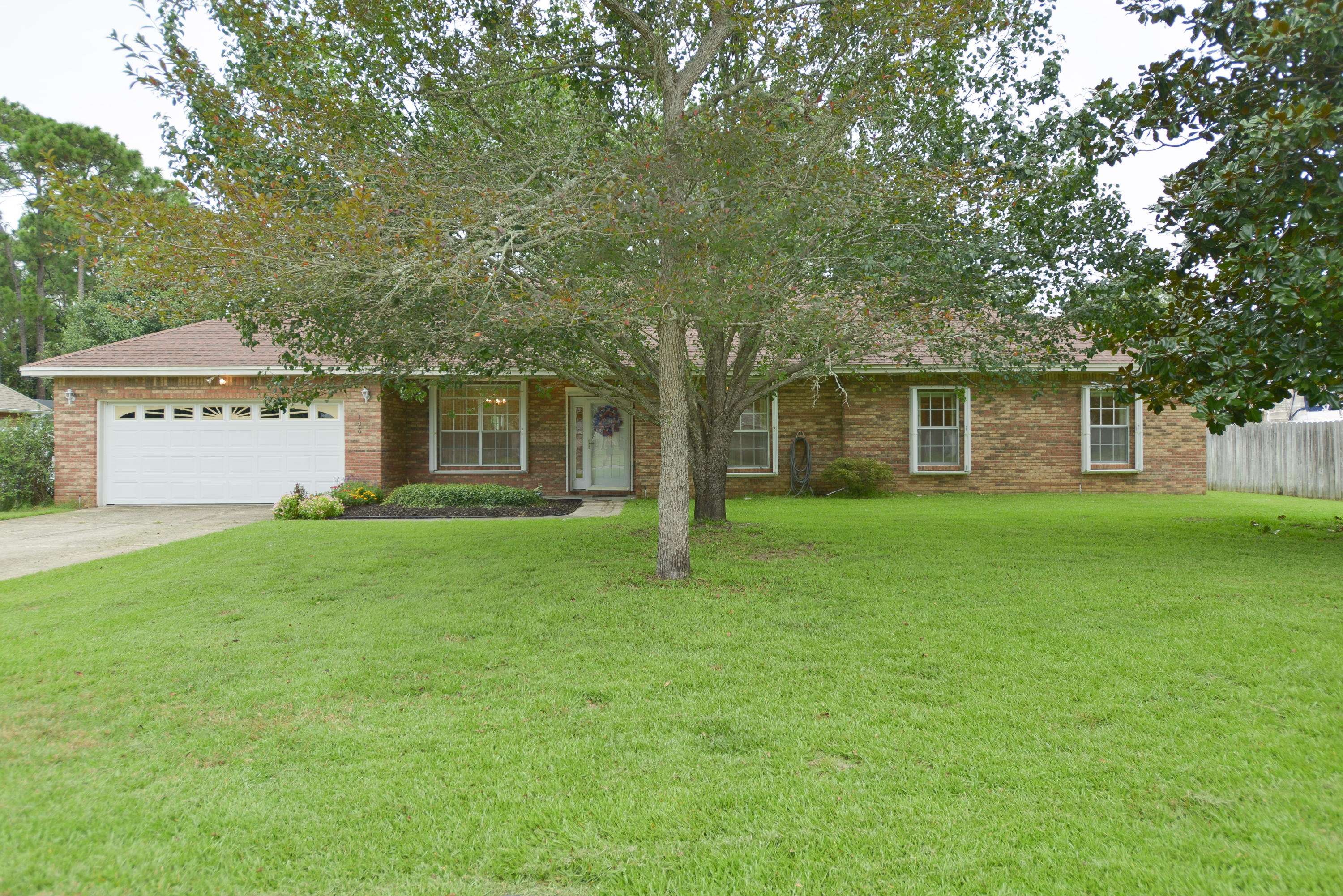 Need to Get Settled before School Starts or Summer Winds Down? This Home is it! Live in the Heart of Niceville in this Original Owner, Spacious All Brick, 4 Bedroom, 2.5 Bath, Home on .44acre lot in Beautiful Dana Pointe. This Desirable Neighborhood has sidewalks and Room to Roam. Home features Eat in Kitchen, Formal Dining Room, Spacious Bedrooms and High Ceilings throughout. Master Bedroom Walk In Closet has built in Sewing Nook Area. Home has Emergency Whole House Gas Generator, Hurricane Shutters and Climatized Food Storage Pantry in Garage. Home has never had any flooding issues. Wide Hallway and Hand Holds for Handicap. Private Park for Residents with Boat Launch, Picnic Area and Dock for fishing. RV/Boat storage permissible on premises. Ready for Immediate Occupancy!