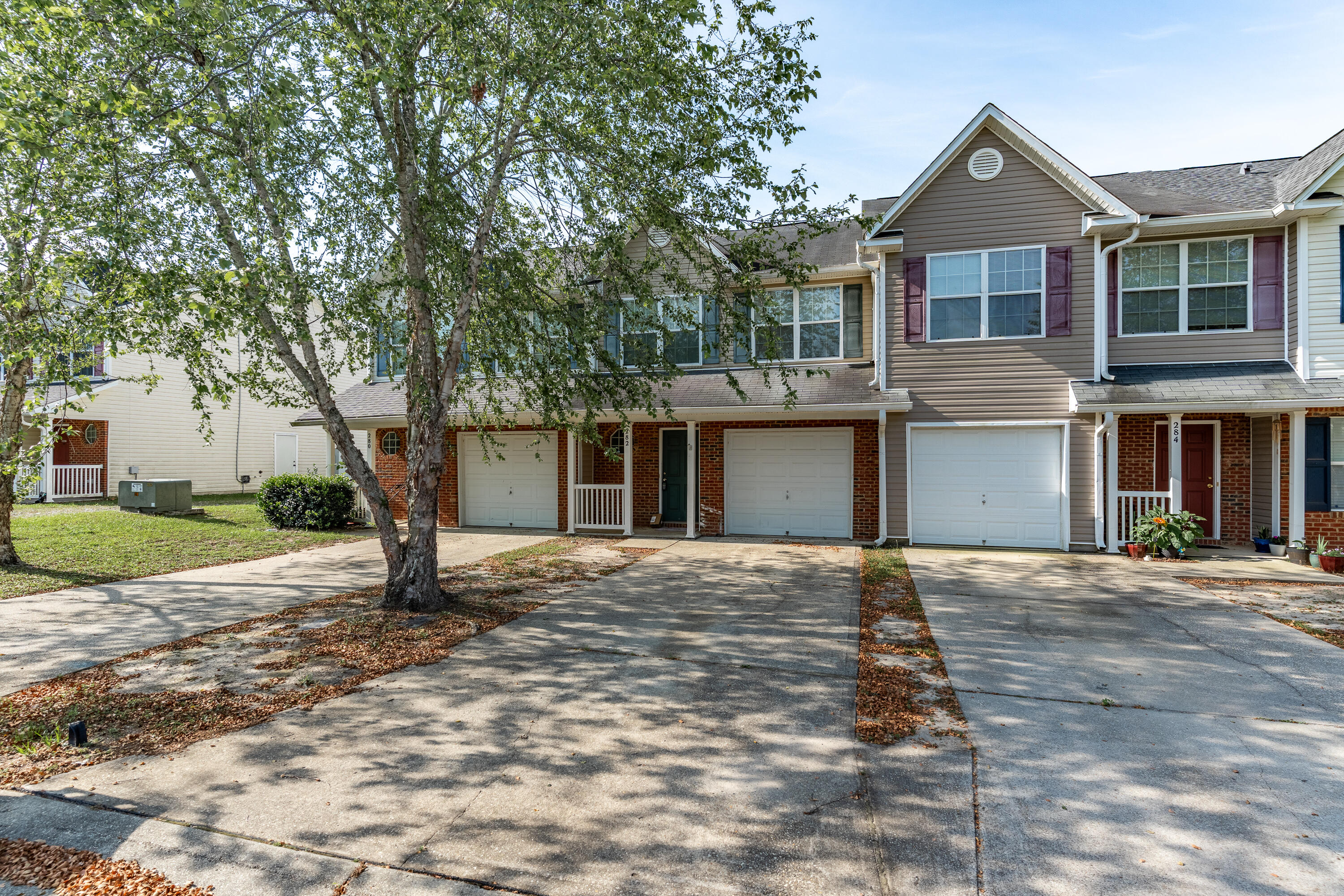Located in the sought-after Rolling Pines community in Crestview, this charming townhome features a private fenced backyard perfect for your furry friends. With a spacious open patio, you can bask in the Florida sunshine on warm summer days. The two-story townhome includes a half bathroom on the first floor, ideal for entertaining guests. Offering a blend of comfort and convenience, this delightful townhome is perfect for anyone seeking a cozy and welcoming living space.