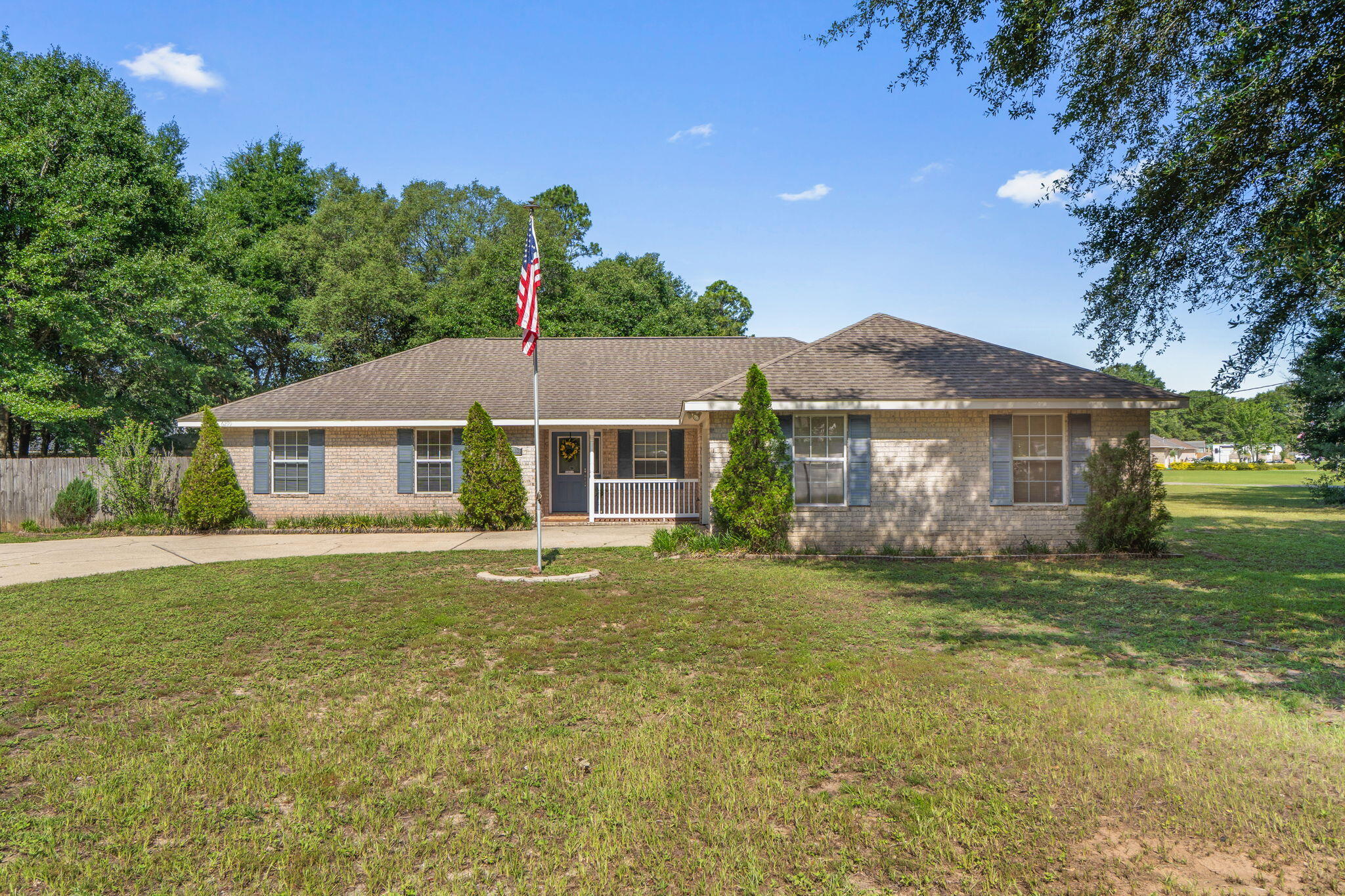 Awesome central location on an oversized lot. NO HOA! Great home that is move in ready! Vaulted ceilings in the living room that opens to the covered back porch. The dining area and kitchen are just off the living room. Primary suite is a large and has both a shower and bathtub. Split floorplan with the other three bedrooms and bath on the other side of the house. All bedrooms are good sizes. Inside laundry room. Side entry garage. Plenty of parking for your boat or RV on the side of the house. The swing on the back porch is the perfect place to spend your afternoons! Gorgeous tree in the backyard provides plenty of shade and could be a great place for a tree house! Just wait until you see how big the fenced backyard is!