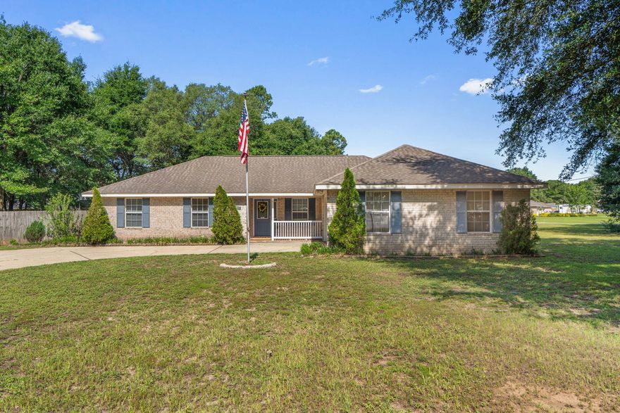 Awesome central location on an oversized lot. NO HOA! Great home that is move in ready! Vaulted ceilings in the living room that opens to the covered back porch. The dining area and kitchen are just off the living room. Primary suite is a large and has both a shower and bathtub. Split floorplan with the other three bedrooms and bath on the other side of the house. All bedrooms are good sizes. Inside laundry room. Side entry garage. Plenty of parking for your boat or RV on the side of the house. The swing on the back porch is the perfect place to spend your afternoons! Gorgeous tree in the backyard provides plenty of shade and could be a great place for a tree house! Just wait until you see how big the fenced backyard is!