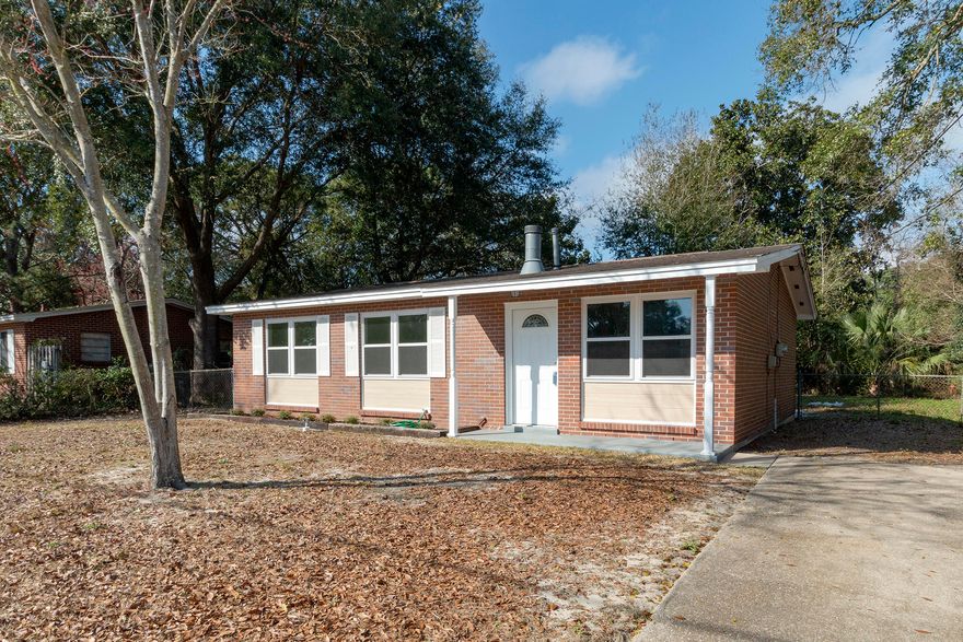 Completely updated, 4BR/1BA, 1,349SF, brick home in the Heart of Fort Walton Beach. This home is centrally located between Eglin & Hurlburt and is just a short drive to shopping, entertainment, & white sand beaches. Updates include new premium vinyl flooring in the living space and bedrooms & tile floors in the kitchen, bath, & laundry room. The kitchen features granite countertops, soft close wood cabinetry, & black appliances. Other updates include new HVAC, plumbing, water heater, Hardie Board siding, windows, & new painted (inside & out). The fenced backyard features a patio space & nice-sized workshop. This home would make the perfect starter home or an amazing investment.