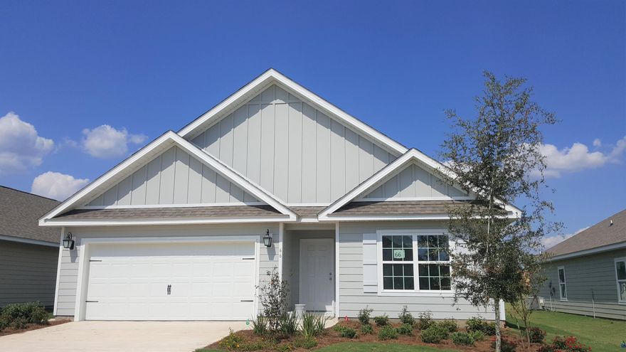 Incredible Standard Features in this home INCLUDE: 3 sides brick, gas hot water heater, gas stub for grill and stove, Granite Countertops in kitchen & baths, tile shower in master, Stainless Steel Frigidaire Microwave, Stove & Dishwasher, Brushed Nickel Plumbing Fixtures, Hard Surface floors in common areas in the home, baths & utility room. Only carpet in bedrooms. Extensive Crown Molding, Designer Brushed Nickel Lighting and so much more.