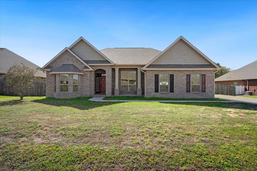 Back on market no fault of seller.  MOTIVATED SELLER offering up to $13,000 towards rate buy down or closing cost assistance  From the moment you walk in you will be captivated by the elegant angles and arches. This home features 3 bedrooms, 2 baths a formal living room or office w/Bay Window & solid double door entrance, a formal dining room w/soaring box trey ceiling. Large and Open Kitchen w/Granite Countertops, Breakfast Bar overlooking the Breakfast Nook. Beautiful Recessed Panel Maple Cabinets, Staggered w/Crown Molding and stainless steel appliances. Breakfast Bar overlooks spacious Family Room with Vaulted Ceiling, Family Room opens to covered back porch great for relaxing or entertaining. Primary Bedroom has a box trey ceiling and Cozy Sitting area. Primary Bathroom has a Granite Counter Top Raised Double Vanity, Separate Shower with Glass Door, Large Soaking Tub with Frosted Window above. Enclosed Toilet and Massive Walk-In Closet. Guest Bath also has Granite Countertops. Laundry room is Conveniently Located Between additional bedrooms. Other features included are: Tile in all wet areas, 5 1/4 '' Base Molding, Orange Peel Walls, Knock Down Ceilings, Fabric Shield Hurricane Protection.  Make your appointment to see this one today.