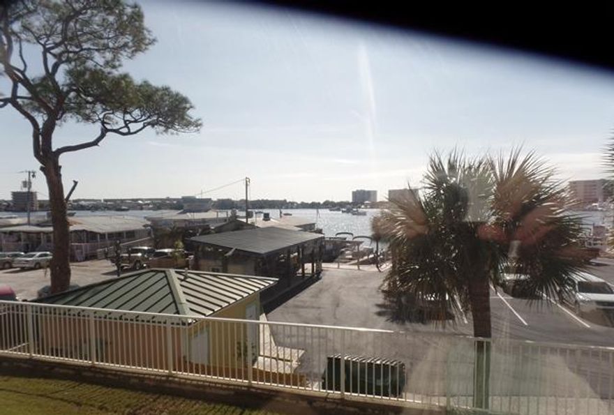 REO ~ Ground Floor Unit at Barataria! The 2 Bd / 2 Ba unit offers tile floors through out including both bedrooms. The spacious kitchen features granite counter tops & large island with breakfast bar. The master suite has large vanity, soaking tub & separate shower. Enjoy all Barataria has to offer from your spacious balcony. Barataria is situated in the heart of it all... fishing, shopping & dining. Don't miss out on this great unit.