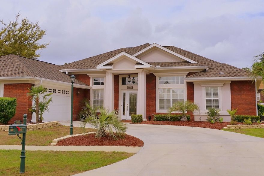 Exquisite 4 bedroom 3 full bath Brick Home w/ salt water pool located south of I-10 in Chanan Estates has everything you can imagine and more. This is truly move in ready with all the upgrades complete. Entering in you will immediately feel the grandeur of 12ft ceilings and heavy crown molding. Kitchen is a chef's dream with 42in upper cabinets, new granite and stainless appliances, 5 burner gas range with double oven, two drawer dish washer, two faucets, natural stone backsplash and so much more. Plenty of space to relax with two living area's formal dining and breakfast room. The great room has Cozy gas fireplace, built in shelving, double ceiling fan and niche lighting. Master suite is luxurious and features his and her walk in closets. His and her vanities, spa tub with jets