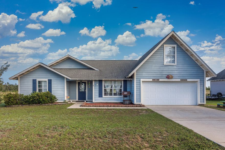 This beautiful home is located just East of DeFuniak Springs in a small quiet neighborhood. The exterior of the home is hardiplank siding with a shingle roof. Going through the front entry it opens up into the living room with a Cathedral ceiling. Across from here is the dining area which opens to the galley kitchen with a small breakfast area overlooking the back lawn and uncovered patio, perfect for an outdoor grill and patio set. The master bedroom has a nice walk in closet with a double vanity and shower/tub combo. Also located on this side of the home you will find the staircase that leads up to the bonus room/4th bedroom and full bath with a big storage closet. Go back down