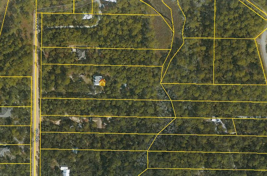 The spacious Florida Cottage located in Pt. Washington, sits on 2.4 acres with a small stream on the very back of the lot. Big beautiful Oak Trees throughout the property and plenty of room to spread out and have privacy. No restrictions or HOA in this subdivision. Walk to the Bay and only 10 minutes to the beach. Close to schools, Grayton Beach, Seagrove Beach, restaurants and shopping.
