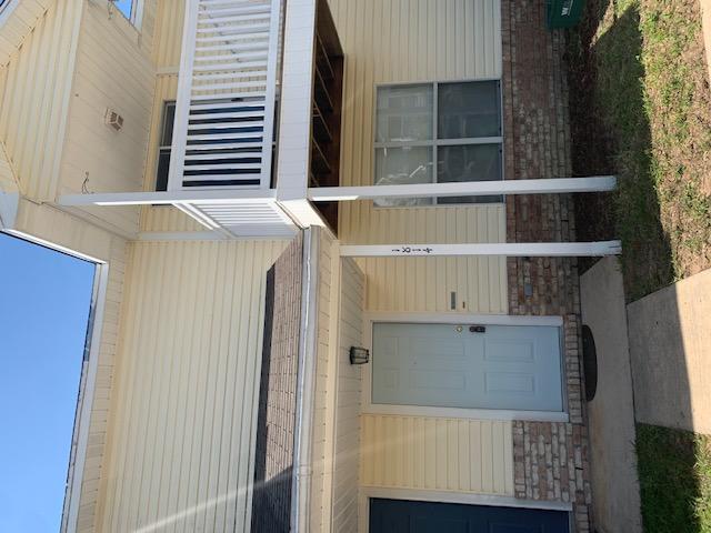 Spacious two story, two bedroom town home with fenced back yard and open patio. Open floor plan features spacious kitchen over looking the living/dining area. Laundry room and half bath are also downstairs for added convenience. Both upstairs bedrooms features their own private full bath and walk in closets. This unit is perfect for roommates, families, or guests. Call today to schedule a showing and don't miss out. Cats allowed, no dogs.