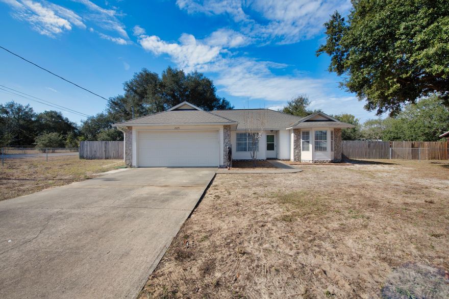 Charming 3 bedroom 2 bathroom home conveniently located and is on a huge corner lot. This is a well-laid-out split floor plan. The large kitchen is fully equipped and has a generous amount of cabinet space, as well as a pantry and a breakfast nook. Additionally, there's a separate dining room and a great room that has a wood-burning, stone fireplace with a log mantel and stone hearth. The master suite has a walk-in closet, and the other bedrooms share a convenient bathroom with its own linen closet. Storage space is more than ample throughout. Other features and architectural niceties include bay windows, trey and cathedral ceilings.