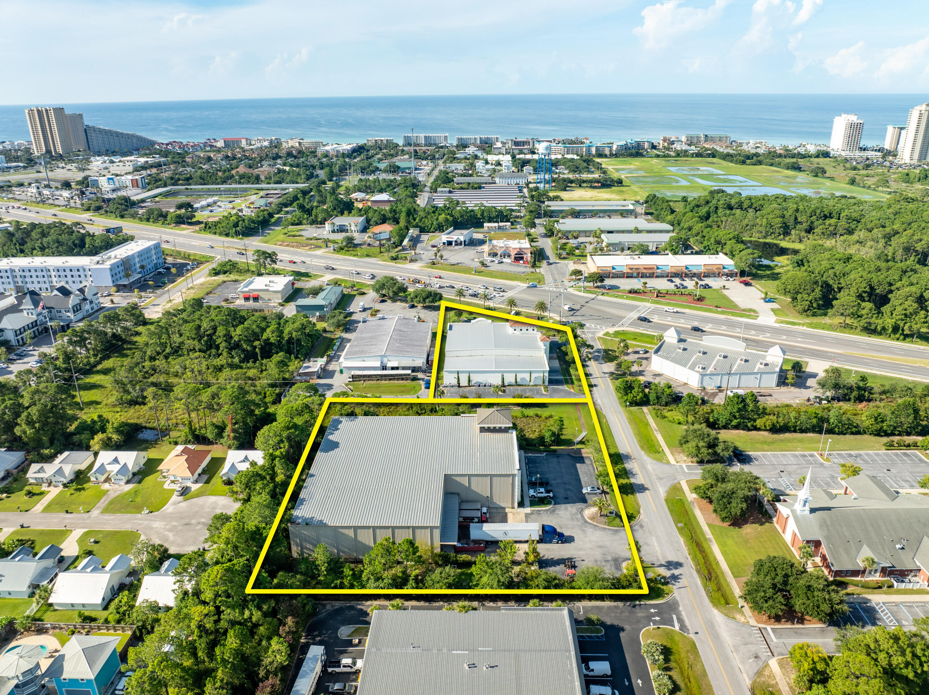 This rare assemblage of prime retail, showroom, and warehouse does not currently exist in the local market, which is adjacent to the synergistic retail nucleus of Silver Sands Outlet Mall and centralized to all the local mixed-use districts, successfully drawing population from all local peripheral sub-markets, including but not limited to Destin and Scenic 30A of Santa Rosa Beach, Florida. Fronting Highway 98 in Miramar Beach, Florida, nearly 50,000 vehicles pass by its 196 fronting feet daily, which ingress and egress lures the traffic into the retail facilities through the convenience of the traffic light at North Geronimo Street and Highway 98. The current owner has committed significant capital to renovate both buildings, which even includes approximately $300,000 for new... escalators to service the second floor of the main showroom.
Parcel 1 contains a two-story building, oriented on approximately 1.18 acres, hosting prime retail and showroom space, as well as private offices, collectively measuring approximately 26,893 conditioned square feet. There is a 3rd floor that accommodates a spectacular executive office, accessible via a private & secured "floating" staircase. The structural integrity of the building is phenomenal, and the finishes throughout are exceptional. Parcel 2 contains a warehouse, office, and showroom, situated on approximately 2 acres, and constructed in 2004, measuring approximately 11,282 square feet on two floors. The warehouse contains a broad loading dock area and massive rack system with a lift and guide rails. Both buildings project an architecturally magnificent image.
This opportunity is irreplaceable locally, as land development code would neither accommodate this massive yield, nor would a developer endeavor upon such a project, as the inflationary costs of this era, coupled with land costs, (even if such prime vacant land at a traffic light were available), which is non-existent), would likely much exceed $20,000,000+. The current business is operating a record-breaking levels, year over year; thus the attributable value to this extremely prime site and assemblage is likely understated.
All showings are by appointment only and require 48+ hours advanced notice. The listing broker must accompany all showings. Financial credentials are required prior to confirmation of any showings. Please do not approach any onsite staff.