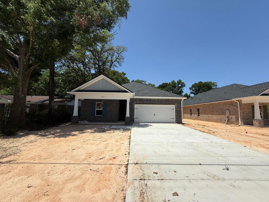 Act Fast! Home must be under contract by May 31 and close by June 30 to qualify for builder incentives! Incentives include coverage of Doc Stamps, Title, Final Survey, and 2% toward the buyer's closing costs. Don't miss out on these valuable savings! Move into this stunning new construction home featuring 5 bedrooms, 3 full bathrooms, including a versatile flex living area--perfect for creating lasting memories with loved ones. With 2,318 sq. ft. of thoughtfully designed living space, this home offers a modern yet charming atmosphere, ideal for multi-generational living. The well-appointed kitchen boasts granite countertops, a tiled backsplash, soft-close shaker cabinetry, pendant lighting over the island, and sleek stainless steel appliances. LVP flooring flows throughout the home, combining durability with style. Custom touches like crown molding, tray ceilings, and satin nickel hardware elevate the design. Enjoy lower energy costs with natural gas powering the heat, cooking range, dryer hookup, and tankless water heater. For added convenience, this home includes a privacy fence, blinds, and a refrigerator. Cabinets, countertops, and flooring are going in now - come check out these amazing finishes! Builder can close by 6/30. 