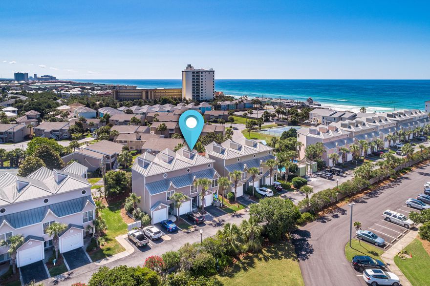 This completely renovated, like new, luxurious townhome in Beach Pointe is only 300 steps to the deeded beach access. Everything from the smallest detail is ready for a permanent resident or a great investment opportunity as a luxury short-term rental. From the moment you step in you will understand the $180K spent to remodel this beauty, starting with the ceramic tiled floors throughout, upgraded quartz counter tops, stainless steel appliances, and 100-year old up-cycled barn wood stairs - perfect for beach day wear and tear. This is the only residence in Beach Pointe with two enclosed sunrooms that adds 180 Sq. Ft. to the home. Enjoy Gulf views from the third floor screened in porch in your rocking chair. Plenty of room for all with two master suites and a third bedroom, each with en suite baths. This full-time residence has had a complete remodel with stunning designer-touch features throughout.  See extensive renovation list in documents.  The private, deeded beach access takes you to a very quiet beach in Destin as Beach Pointe has only 35 units.  Relax year-round in the heated, private community pool.  Beach Pointe has a community feel as there are more full-time residents than short-term rentals in the neighborhood; however, short-term rentals are always welcome.  Pet friendly, you will meet your neighbors walking their dogs in the designated community green space.  There is plenty of storage for your golf cart and your beach toys in the one-car garage. Why wait another day for your beach cottage. Rarely does a home like this hit the market, and it will not last long.  All renovations were completed by a licensed contractor and were permitted through the City of Destin.  This move-in ready home has storm shutters installed, new hot water heaters and upgraded 18 Seer HVAC units to handle extra square footage. Flood zone "X".  Flood insurance is not required.  VA approved building. Walking distance to Capt. Dave's on the Gulf, Crab Trap and Kenny D's.  Must see quickly or you will miss out!