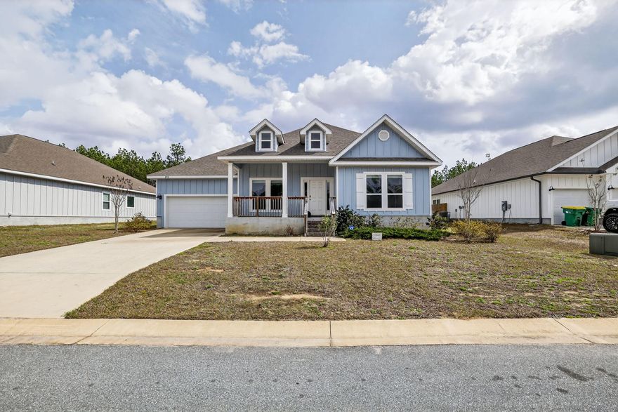 Beautiful McKenzie floor plan with 5 bedrooms and 3 bathrooms in the desirable Hillwood Estates community in North Crestview. Built in 2022, this well-maintained home features an open design with trey ceilings, wood-look EVP flooring in main areas, and Frieze carpet in the bedrooms. The kitchen offers granite countertops, stainless appliances, an island bar, and a large pantry. The spacious primary suite includes a granite double vanity, garden tub, and separate shower. Smart Home Connect System with video doorbell, keyless entry, and automated porch lighting. Durable Hardie exterior adds great curb appeal. Open house March 14, from 12-3