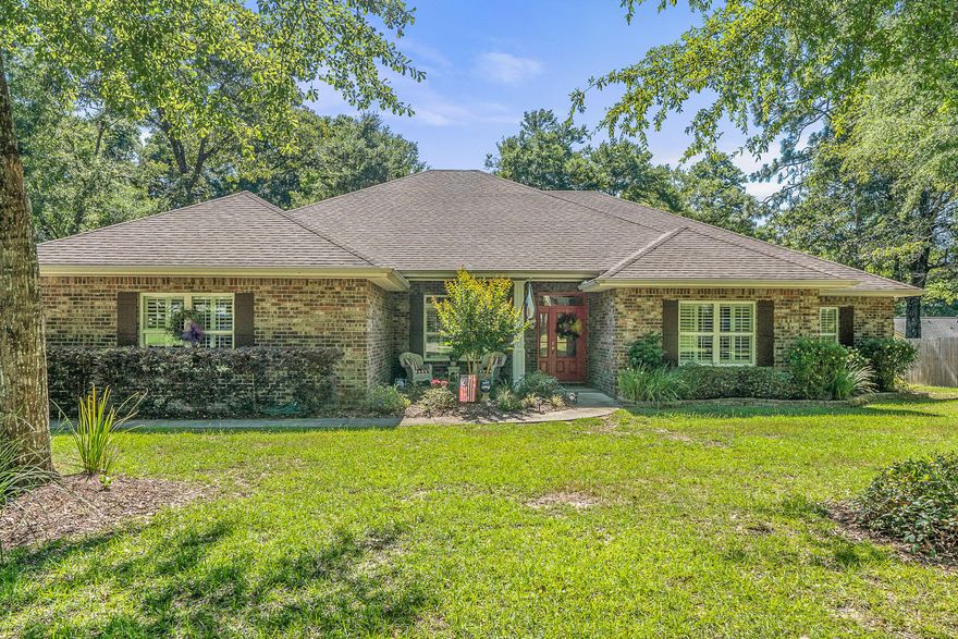 Stunning newer custom home in Silver Oaks with outstanding curb appeal! This home has every detail you are looking for to include a custom dream kitchen, hickory wood flooring, crown molding, tall ceilings, 5 inch spray foam in the attic, an abundance of storage in the main living area as well as above the home in the walk-up attic space.
The kitchen features a 6 burner gas range with grill and griddle, custom hood, black honed granite, custom white cabinetry with soft close drawers, large bar with microwave built-in, and a farm style apron sink. The kitchen is the heart of the home and this one centers around a large gathering space with gas fireplace and dining area. The kitchen offers an abundance of natural light and a nice exit to the back porch. The master bedroom is over sized with plenty of room to accommodate large furniture. You will be pleased when you see the two walk-in closets, and outstanding en suite master bathroom...this space is to die for! The separate vanities with granite counters, one even has a vanity section. There is a gorgeous freestanding tub situated in front of a HUGE walk in shower with multiple shower heads and bench. 

The other 2 additional bedrooms have easy access to their own bathroom, both additional bathrooms feature tiled showers and /or tub with custom vanities, granite counters and upgraded lighting. 

This home has many additional upgrades that are unmatched in this area to include: Central vac, crown molding throughout, plantation shutters and wood blinds, interior doors are solid (not hollow), all windows are Low E making the home cheaper to heat and cool, PEX plumbing, 2 - 13 Seer HVAC's, Tankless hot water heater, sprinkler system for front and rear yard, professional landscaping and over sized garage!