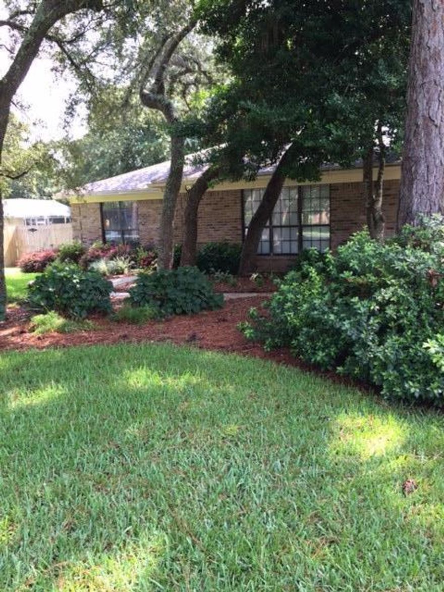 Lovely home in Bluewater Bay. Convenient location to shopping and schools. Fenced yard with in ground pool. French doors in the great room open to covered patio and pool.