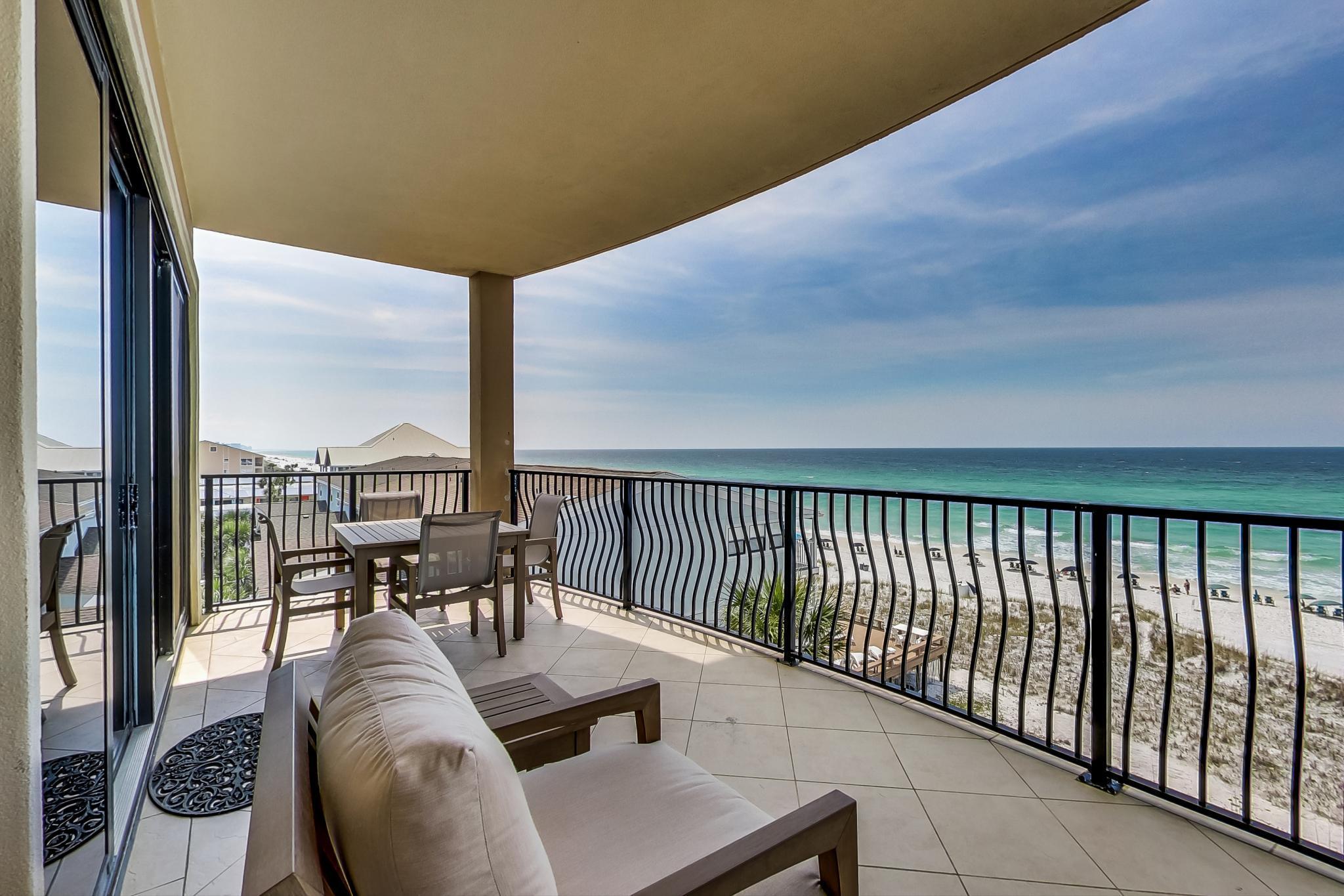 Sweeping views of the Gulf of Mexico accentuate this fully renovated waterfront corner condominium. The only fully reconstructed unit in Villa Coyaba, this property showcases 4 bedrooms, 3 full bathrooms and an additional bunk space. As the highest grossing income unit in the development, this property has been professional designed and decorated with the luxury vacation experience in mind. Offered fully furnished, features of the home include a large open concept living area with gas fire place; chef's kitchen with farm sink, Wolf range and Sub-Zero refrigeration; spacious gulf front master suite with large walk-in shower and closet; large guest rooms; and well-thought-through storage. While many properties claim to be renovated, this unit has been gutted to the studs, reconfigured and