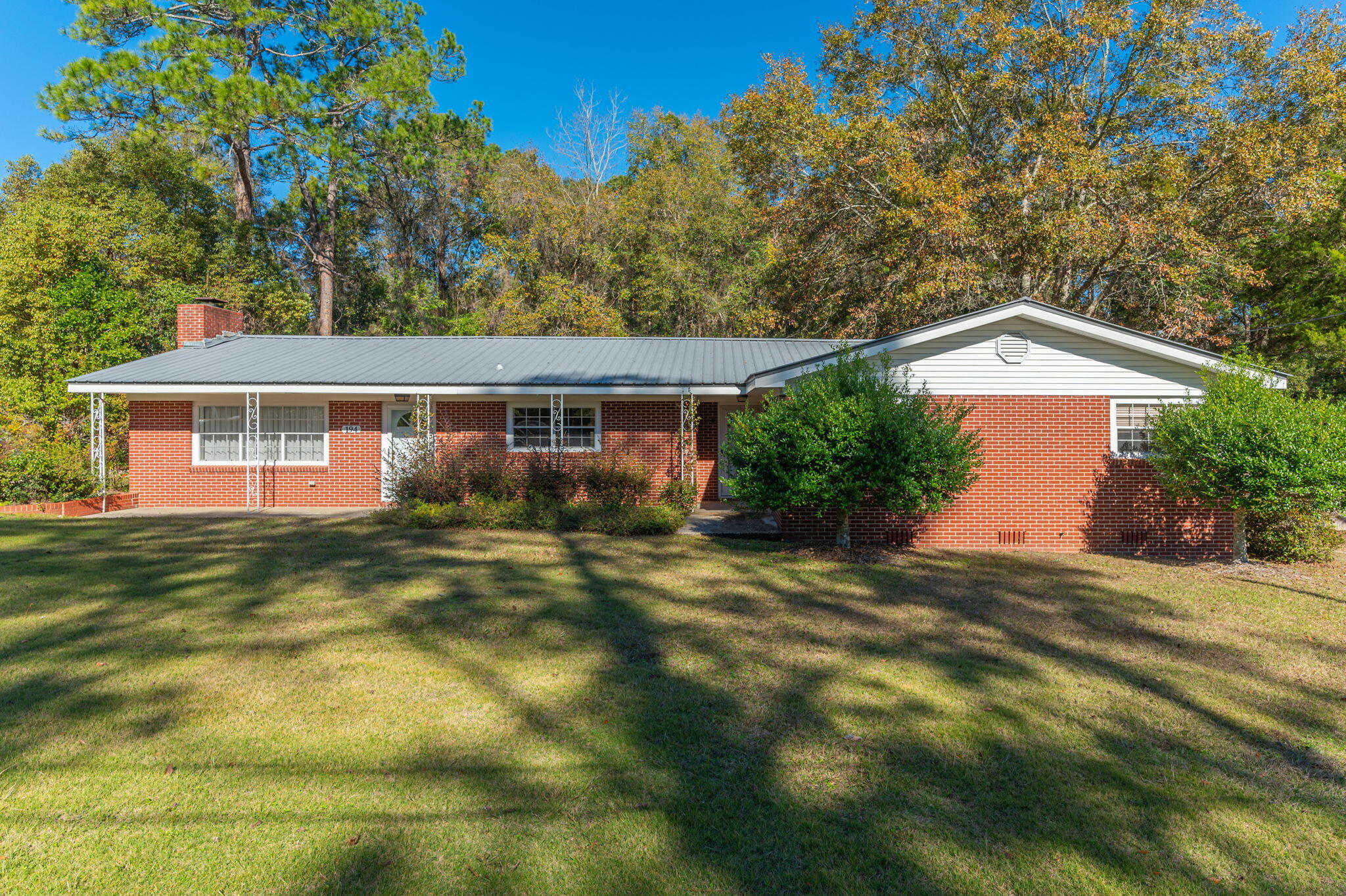 This charming 4-bedroom, 3-bathroom brick home offers comfort and style on a spacious lot with fruit trees and no HOA. Built in 1960, it features thoughtful updates, wood cabinets in the kitchen, a breakfast nook, and a separate dining area. The large living room with a fireplace adds warmth and charm. The lease includes the home and front portion of the property, while the owner plans to convert the back space into a studio. Contractors will periodically be on-site for updates, and tenants will cover shared utilities until the conversion is complete. Extra parking will be added for convenience. Don't miss out on this unique, well-maintained rental opportunity! Application required- Tenant requirements include 600 credit score, one year of employment & household monthly income to be $6000