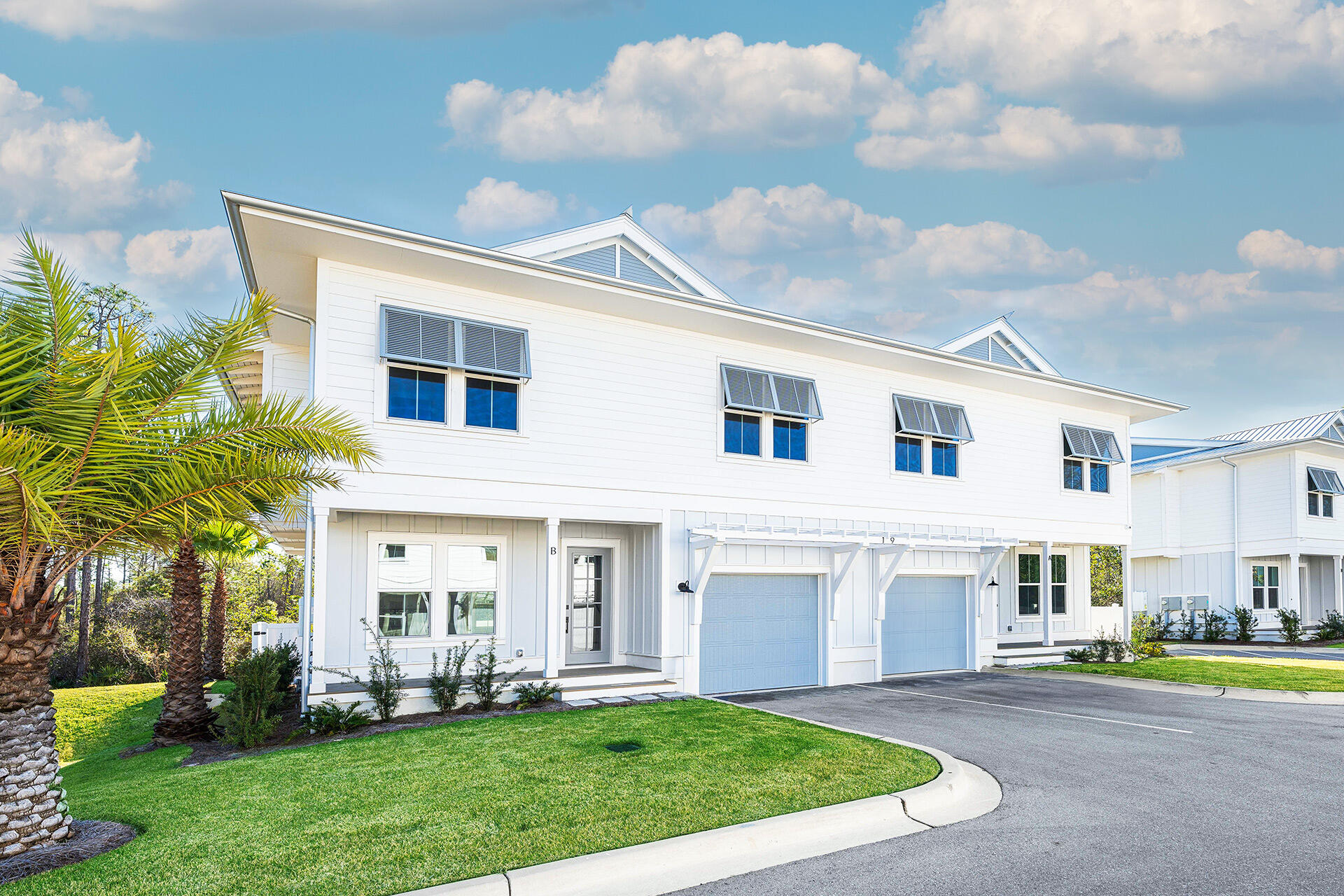 Welcome to Century 393, the newest and most exciting townhome development in Santa Rosa Beach, Florida. Perfectly positioned at 520 S Co Hwy 393, this exclusive soon-to-be gated community offers unparalleled access to 30A's best just a three-minute golf cart ride to Ed Walline Beach, Shunk Gulley, Papa Surf Burger Bar, and the lively Gulf Place town center. Unit #19B boasts 1,914 square feet of heated and cooled living space, with 2,412 square feet under roof. Designed for modern coastal living, this three-bedroom, four-and-a-half-bath townhome features a versatile bunk room, high-end finishes, an outdoor kitchen, and a fully fenced backyard making it an ideal investment or personal retreat. The open-concept first floor seamlessly connects the living, dining, and kitchen areas, with ample natural light enhancing the coastal elegance. A walk-in pantry, laundry room, powder bath, and one-car garage complete the main level.
Upstairs, the spacious primary suite boasts a dual vanity and walk-in shower, while both guest bedrooms each feature their own private ensuite baths. The additional bunk room offers flexibility as an office or extra sleeping area, complemented by a hall bath with a double vanity and tub/shower combo. While four of the eight units at Century 393 include private hot tubs, Unit #19B does not - though every home in this exclusive community enjoys an outdoor kitchen and a fenced backyard for private entertaining. A dedicated ice machine in the garage makes beach days effortless. Century 393 allows short-term rentals, presenting an excellent investment opportunity. This marks the first completed phase, with future expansion on an adjacent 10 acres set to introduce a stunning community pool, sun deck, and cabana. Don't miss your chance to own in this premier up and coming development along 30A.