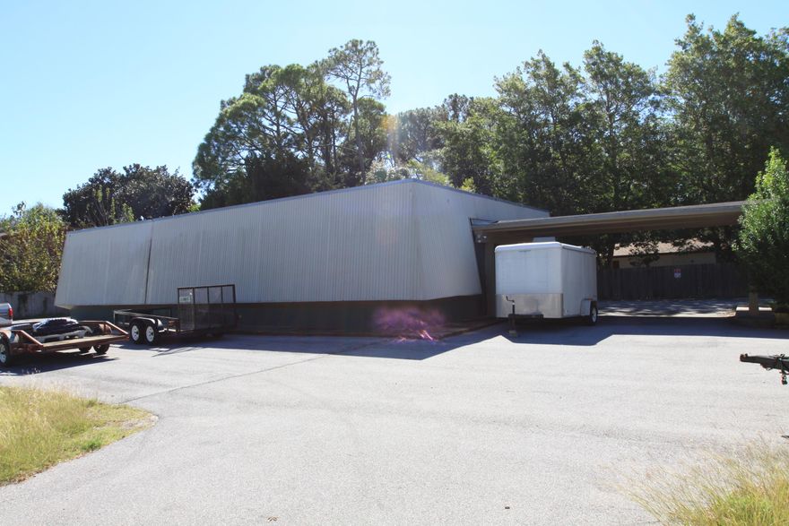 2520sf office/ warehouse building in Fort Walton Beach for lease or lease/ purchase. This property consists of multiple office rooms, conference room, kitchen, lobby, storage room and small warehouse area. Located on a corner lot with great access and plenty of parking. Seller says that the space use to be a large open area used as a dance studio and that the walls could be removed if necessary. Great location for a church, daycare, studio etc.
