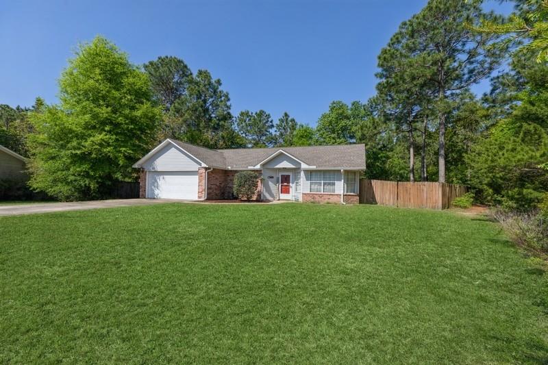 **Highest and best by 10 am Sunday, 4/24/21. Sellers will review all offers and repsond by 5pm Sunday, 4/24/21.Charming home located south of I-10 tucked away on a huge level lot. Bring your boat or RV because there is plenty of parking space. Walking path to local park right from your front yard. Great use of space in this open living floorplan. Feel the warmth of the home when you enter the foyer. The kitchen is easy to work in with great counter space including an island and pantry. Together, the kitchen and dining space flow openly to the living area. And the new slider allows for lots of natural light in the living room.
The spacious primary bedroom suite offers privacy and seclusion. New Stainmaster carpeting recently installed is warranted against some types of staining. The memory foam pad makes it feel like you are walking on a cloud.
The attached bath features a garden tub/shower, two individual closets, and double vanities. This split bedroom plan offers two additional bedrooms and a second full bath. There's also a flex room for use as an office, craft room, or a 4th bedroom. A double garage and laundry round out the home with the privacy-fenced backyard, open patio, and an adorable raised garden to complete it.
Note: HVAC installed in 2019; roof installed in 2018. Any lawn sprinklers/pumps are being sold in 'as is' condition.