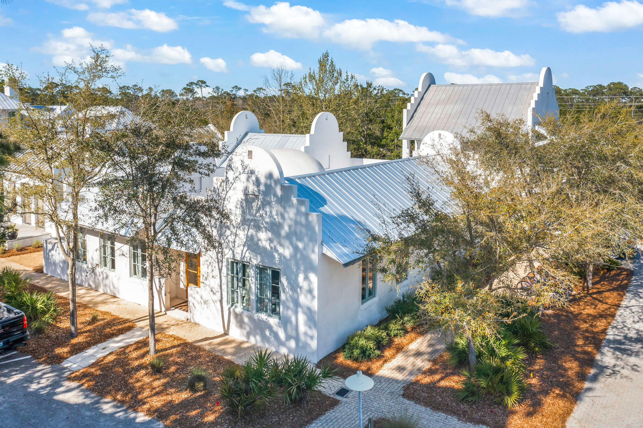 Coming soon! Charming coastal home, with carriage house, garage and pool, located on a large corner homesite directly adjacent to the Rosemary Owner's Pool.