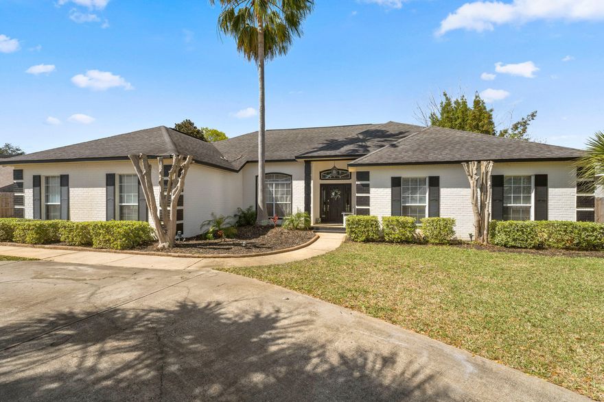 Beautifully designed Indian Bayou home featuring a circular driveway, a two-car garage, and a private enclosed pool. This split-floor plan accommodates a wide variety of homebuyers with spacious layouts and designated area use. Several updates have been done throughout the entirety of the home including new LVP flooring with a 4-year warranty, new 2022 Refrigerator, and recently renovated bathrooms. Upon entering, the foyer will lead into the open layout of the living room, dining room and kitchen area - each of which is perfect for hosting family and friends. Directly off the living room is a large sunroom that overlooks the outside patio area and pool. The outdoor area is perfect for entertaining as a paradise retreat for swimming, grilling, and a glass of wine while relaxing.  The