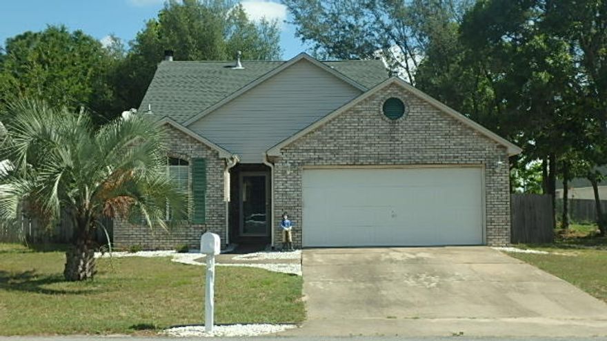 Great buy with this 3 bedroom, 2 bathroom home is located on a corner lot on the south end of Crestview. As you enter the home, you will notice the cathedral ceiling and staircase that lead you to the upstairs loft area, 2 bedrooms and a full bathroom with a skylight. The sunken living room has laminate flooring, ceiling fan, wood burning fireplace with brick hearth & wood mantle. The French doors lead you to the covered & screened in back patio with ceiling fan. The living room, kitchen & nook area have laminate flooring & ceiling fans. All bedrooms, staircase & loft have new carpet. The loft & all bedrooms have ceiling fans & 2 wood faux blinds thru-out. The kitchen has a breakfast bar, nook area & separate eating space, refrigerator, range, microwave, dishwasher & garbage