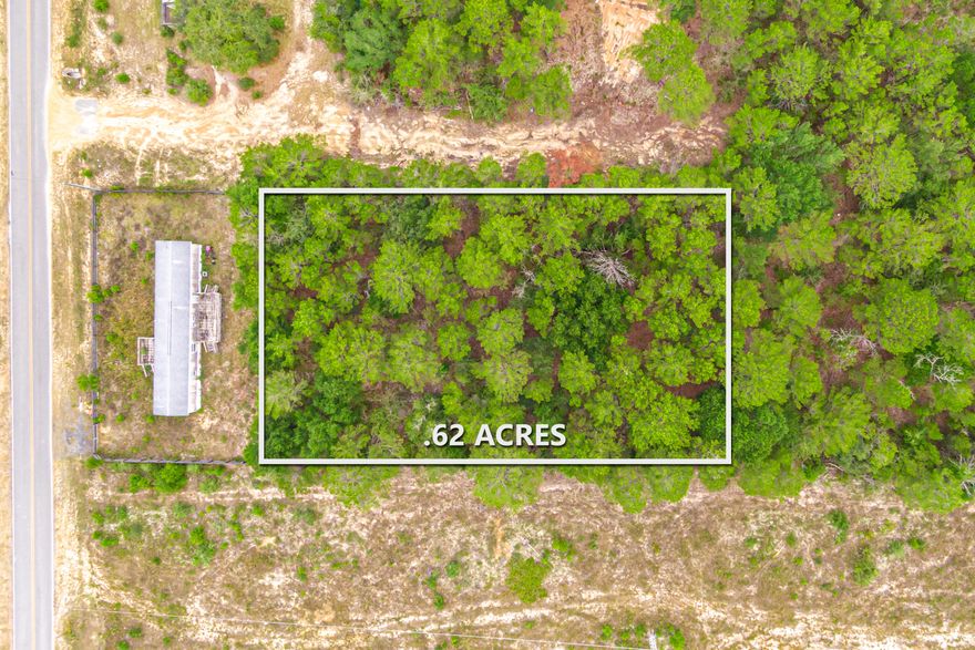 Discover the perfect opportunity to build your dream home or make an investment with this beautiful 0.62 acre wooded lot in DeFuniak Springs, FL. Priced at just $28,000, this property offers a charming and private setting, surrounded by nature, yet conveniently located around local amenities.