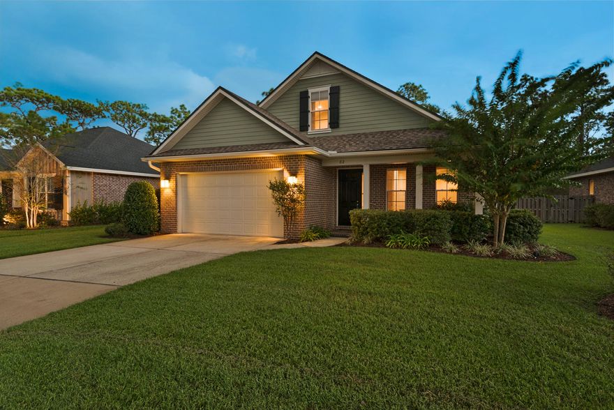 Enter this stunningly refined, elegant home punctuated by a magical yard. From sweeping, open spaces with 9' ceilings to rich details in fixtures and finish, this stately home suits the most discerning lifestyle. Hardwood floors, crown molding, carefully selected paint and lighting wrap around this private haven. Imagine the open kitchen and mirrored backsplash reflecting your style entertaining guests. Smile at the fanciful lights throughout. The first floor master suite has a luxurious shower and is tucked away with wooded view. Upstairs find 3 more ample bedrooms, lovely bath. A sunny office is off the front hall, because who would want to leave? The crowning jewel- breathtaking, meticulously planned yard with fanciful decks, cabana. Over $48,000 in improvements make this home shine.