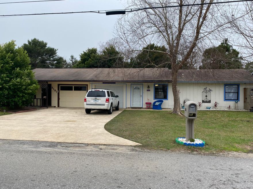 GREAT 2 BED/ 1 BATH RESIDENTIAL ATTACHED WILL MAKE A FANTASTIC STARTER HOME OR COULD GET YOU SOME RENTAL INCOME AS AN INVESTMENT PROPERTY. THERMOSTAT IS ENERGY SELECT FROM GULF POWER. ALL APPLIANCES TO REMAIN INCLUDING WASHER AND DRYER. ICE MAKE IN REFRIGERATOR DOES NOT WORK. DOUBLE PANE WINDOWS THROUGHOUT THE HOME. HUGE OUTDOOR SHED FOR EXTRA STORAGE OR COULD BE USED AS A WORKSHOP. OUTDOOR CAMERAS IN BOTH AND BACK OF HOUSE FOR EXTRA ADDED SECURITY. ROOF WAS REPLACED IN 2004. NEW A/C INSTALLED IN 2015 WITH 2 VENTS ADDED IN THE GARAGE. NEW DRAIN FIELD LINES PUT IN 2015. HOME IS NOW CONNECTED TO SEWER (MARCH 2020). NEW HOT WATER HEATER 2016. ENTIRE INTERIOR AND KITCHEN CABINETS HAVE BEEN RECENTLY PAINTED. BRAND NEW CARPET IN BOTH BEDROOMS . COME BY AND SEE THIS BEAUTY.