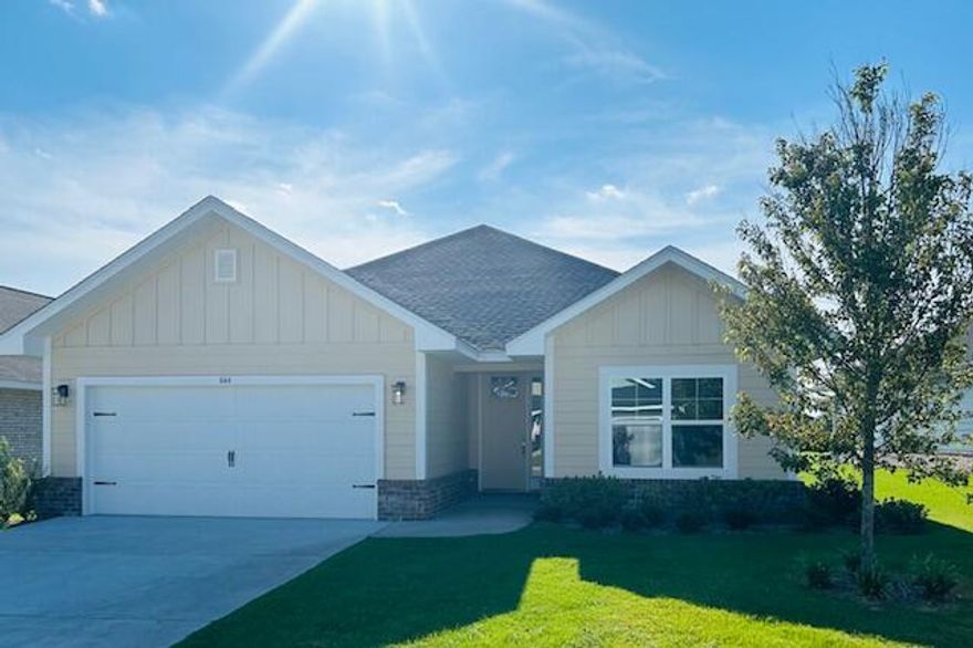 Limited-time offer: Receive up to $35,000 price discount on this home. Ask about our 3.99% interest rate buy down promotion with our preferred lender. Community also has USDA financing with zero down payment for those that qualify. New Craftsman style home with a brick skirt and hardiboard siding.  20 minutes to 30A Gulf Beaches or 15 minutes to DeFuniak Springs. 3 BR / 2 BA with 2 car garage + garage door opener, cathedral ceiling, 8' entry doors, large covered rear patio 15' x 9', quartz countertops, CoreTec Pro Plus Luxury Vinyl Plank flooring throughout, no carpet.  Separate garden tub + shower in Master Bath, Moen faucets, lever handled hardware, & fully sodded yard with sprinkler system. *Some photos have been virtually staged to show home's potential.*