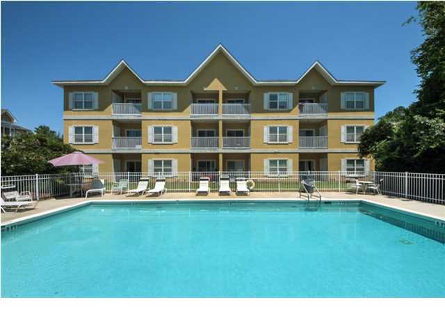 Heron's Watch is a prime location on 30A in the heart of Seagrove. Whether you are searching for a place to call home or a fantastic deal on an 30A, this unit will suit all of your needs! This top floor unit boasts vaulted ceilings in the living room and a sliding door leading to the balcony fills the large space with light. The large kitchen is appointed with stainless steel appliances, attractive maple cabinets and solid surface counter tops. The bedrooms are neutrally carpeted while the kitchen and living room have ceramic tile floors. With stackable washer & dryer in the laundry room and a secured storage closet on the balcony, this unit is an ideal turn-key condo. The community enjoys access to a dock on the beautiful Eastern Lake and the nearby beach access is only a paddle away!