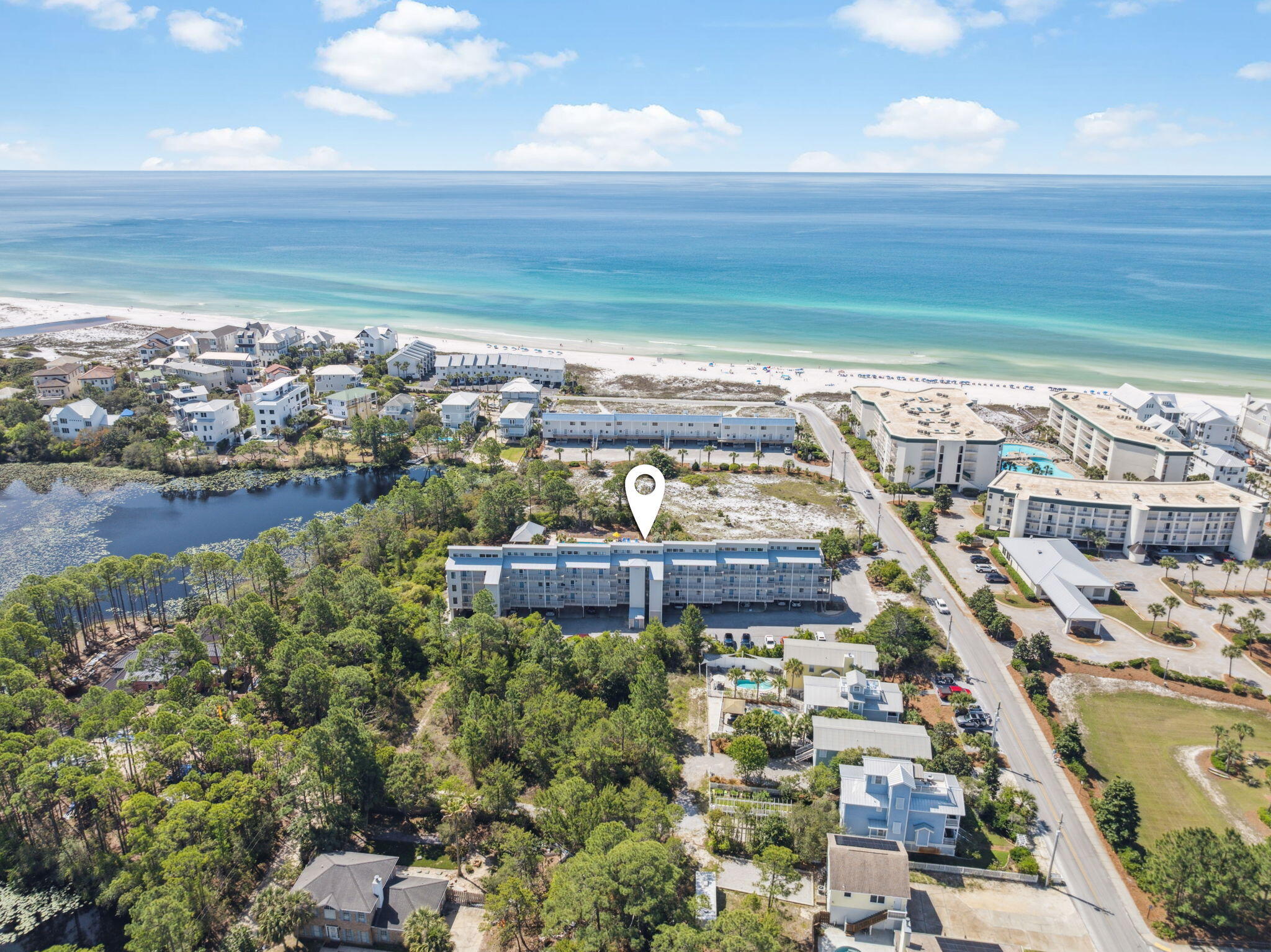 Coastal Studio Retreat - Steps from Walton Dunes Beach AccessNestled on the tranquil south side of 30A, between Watersound Beach and Seagrove Beach, this charming studio offers the perfect blend of relaxation and convenience. Just a short walk to the sugar-white sands, you'll enjoy incredible beach access and stunning poolside views.The interior boasts luxury vinyl flooring throughout and elegant tile in the bathroom. A charming shiplap accent wall enhances the craftsman coastal feel, while the modern kitchen boasts Quartz countertops, a stylish breakfast bar, new cabinets, and a sleek stainless steel farm sink. The bathroom is a true retreat, featuring a tile shower with pebble flooring and a glass tile accent. Maximizing space and functionality, the studio includes a Murphy bed with built-in cabinetry and additional hallway closets for extra storage. A sleeper sofa allows the property to comfortably accommodate up to four guests, making it a great rental investment.

Step outside to a large private balcony overlooking the pool and beautifully landscaped groundsa perfect spot for your morning coffee or to unwind after a day at the beach.

Whether you're looking for a personal getaway or a high-performing investment, this studio delivers exceptional rental returns, with rental projections estimated at $40K - $50K annually. Step into paradiseyour dream coastal retreat awaits!