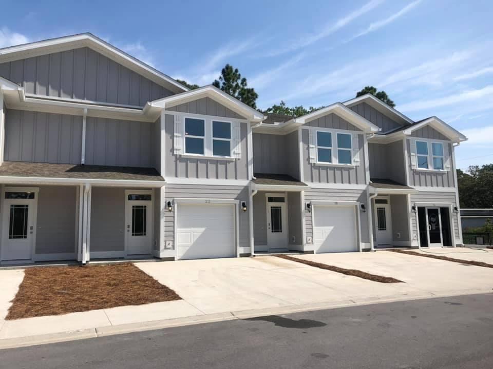 Welcome to Sandhill Pines! This community located off Mack Bayou Road is just minutes to Grand Blvd and Scenic Hwy 30A. These 3 bed, 2.5 bath town homes have EVP flooring throughout the entire home, excluding stairs and all bedrooms. Features include: granite countertops and ivory colored shaker style cabinetry with brushed nickel hardware. This is an exterior town home unit, only one neighbor. Perfect location to get to the beach, shopping, restaurants and the elementary school in under 10 minutes!***Home is NOT furnished. Photos are stock and colors, upgrades and selections may differ