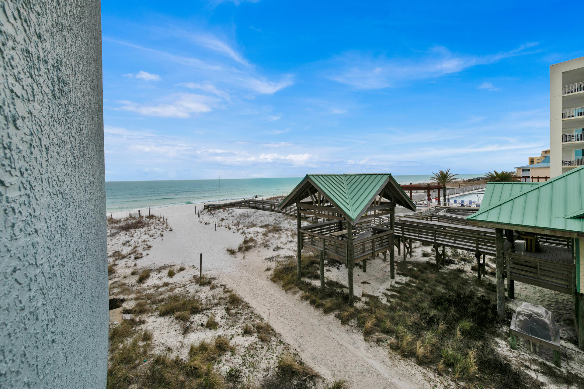 Great Rental Income $39,778 (2022) for this cozy, LUXURY STUDIO!  ~  Truly A GEM with pleasing views of the emerald waters of the Gulf Coast!  Offered FULLY FURNISHED! ~NEW ADIRONDACK CHAIRS w/TABLE on Balcony!! TurnKey Ready and tastefully decorated with HVAC in April 2020 ~ Queen-Size Bed - Comfy Sofa ~  Fully Equipped Kitchen ~ 55'' & 65'' Samsung TVs and more.  Facilities include:  Beach Front property, Swimming Pool and  Fitness Room   ~ High-Speed Wi-Fi  ~ Free Parking  ~~ Building has Updated (2021) Building repainted~ Walkways and balconies recoated and waterproofed~ Concrete repairs ~ Exterior efis repaired before painting~ Handrails in stairways replaced in West Building~ Common entryways replaced~