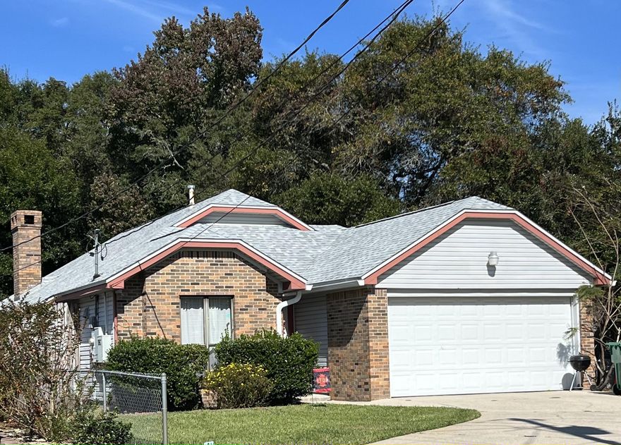 This beautiful 3 bedroom, 2 bathroom home is the one you've been looking for! Situated on a 0.187 acre Cul-de-sac lot, this home includes a fully fenced back yard. Walking up to the front door you are greeted by a manicured front lawn and a flower bed. Through the entrance you find the kitchen on your left, then you enter a large living area with a great fireplace and room for dining.  This home's interior has been repainted in a friendly blue color. The primary bathroom has been updated with a grab bar and updated fixtures in the enlarged shower. There is an in-ground sprinkler system fed by a well, and a whole-house NG generator.