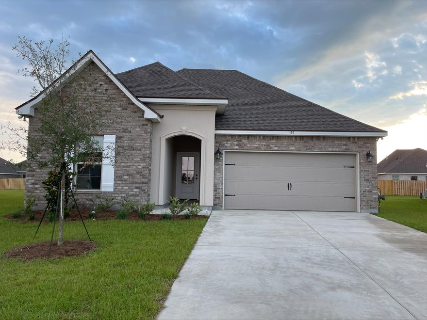 Located on a cul-de-sac lot, the TRILLIUM IV A in The Bluffs at Lafayette community offers a 3 bedroom, 2 full bathroom open and split design. Upgrades added (list attached).Special Features: double vanity, garden tub, separate shower, and walk-in closet in master suite, master closet opens into laundry room for added convenience, kitchen island, walk-in pantry, covered front and rear porch, recessed lights, crown molding, custom framed mirrors in bathrooms, undermount sinks, landscaping, architectural 30-year shingles, flood lights, and more!Energy Efficient Features: tankless gas water heater, kitchen appliance package with gas range, vinyl low E windows, and more!