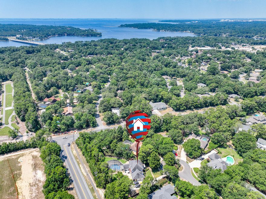 Fantastic location. Excellent neighborhood. Recently renovated. This 4 bedroom, 3 full bathroom, 1 half bathroom, custom built, traditional style home nestled in the sought after Rocky Bayou Estates community. The grand staircase welcomes you into the foyer that is the icing on the cake to this recently transformative renovation that you must see. Gorgeous luxury Shaw LVP flooring throughout the entire 1st floor and staircase, bedrooms are new Shaw lifeguard carpet. Wait till you see the Quartz counter tops in the new kitchen with new cabinetry from local craftsman with soft hinges, drawers and black stainless Samsung appliances. To the cook's delight a 36 inch gas range and double oven with an out of this world walk-in pantry. Formal dining room with raised ceilings just off the kitchen.