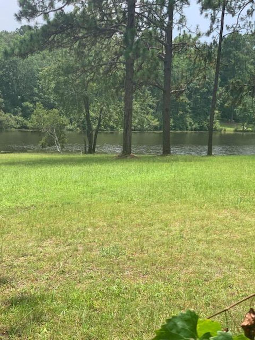 Beautiful 1 Acre Lot on a lake, ,  Bring your building plans and build your dream home.  Public water available and buyer would need to add a septic tank. Legal Description : COMMENCING AT THE NE CORNER OF THE SE A1/4 OF THE SW A1/4 OF SECTION 6, T-3-N R-23-W, OKALOOSA COUNTY, FLORIDA, RUN S00DEG05'03'' ALONG THE 40-LINE, 380.11 FEET; THENCE S80DEG36'45W'' 433.85 FEET TO THE PONT OF BEGINNING. THENCE CONTINUE S80DEG36'45''W, 100.00 FEET; THENCE S00DEG00'00''E, 65.01 FEET, THENCE N56DEG53'59''E ALONG SAID WATER'S 13.52 FEET; THENCE N00DEG00'00''W, 394.86 FEET TO THE POINT OF BEGINNING. CONTAINS 1.0 ACRES, MORE OR LESS