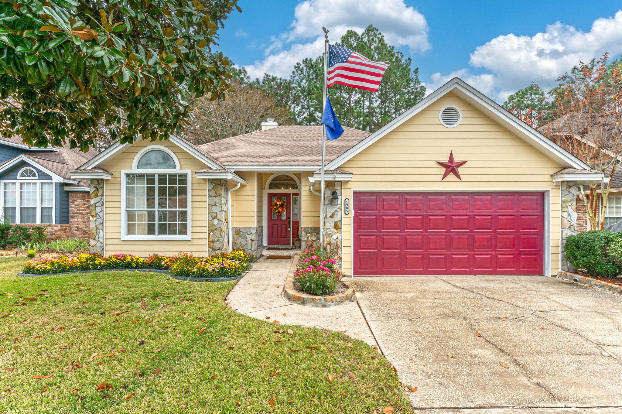 Welcome to this stunning 3-bedroom, 2-bathroom home with 1,800 square feet of living space, located in the highly sought-after Crosswinds Landing! With its charming curb appeal and modern updates, this property is a true standout. The home boasts a newer roof and has been meticulously maintained, ensuring it is move-in ready. A flagpole in the landscaped front yard adds a touch of pride and character to the home.As you step inside, you'll be greeted by high ceilings and tile floors throughout, creating an open and airy ambiance. A custom bonus room adds versatility to the floor plan, perfect for a home office, playroom, or extra living space. The kitchen is both functional and stylish, featuring crisp white cabinets, a coordinating backsplash, stainless steel appliances, a breakfast bar, a pantry, and an inviting eat-in dining area.

The living room is a cozy haven with a gas fireplace, mantel, and built-in shelving. Retreat to the grand master suite, complete with a spacious walk-in closet. The newly renovated master bathroom is a luxurious oasis, offering an open tile shower with a rainfall showerhead, handicapped-friendly accessibility, a Bluetooth-enabled exhaust fan, and a double-sink vanity with plenty of storage space.

Step outside to your private backyard retreat, where you'll find a patio, low-maintenance artificial turf, and a new fence. A door conveniently leads to a peaceful creek, providing a serene escape right in your own backyard.

Located halfway between Eglin Air Force Base and Hurlburt Field, this home offers an easy commute to both bases, making it an ideal location for military families or those seeking convenience to local amenities.