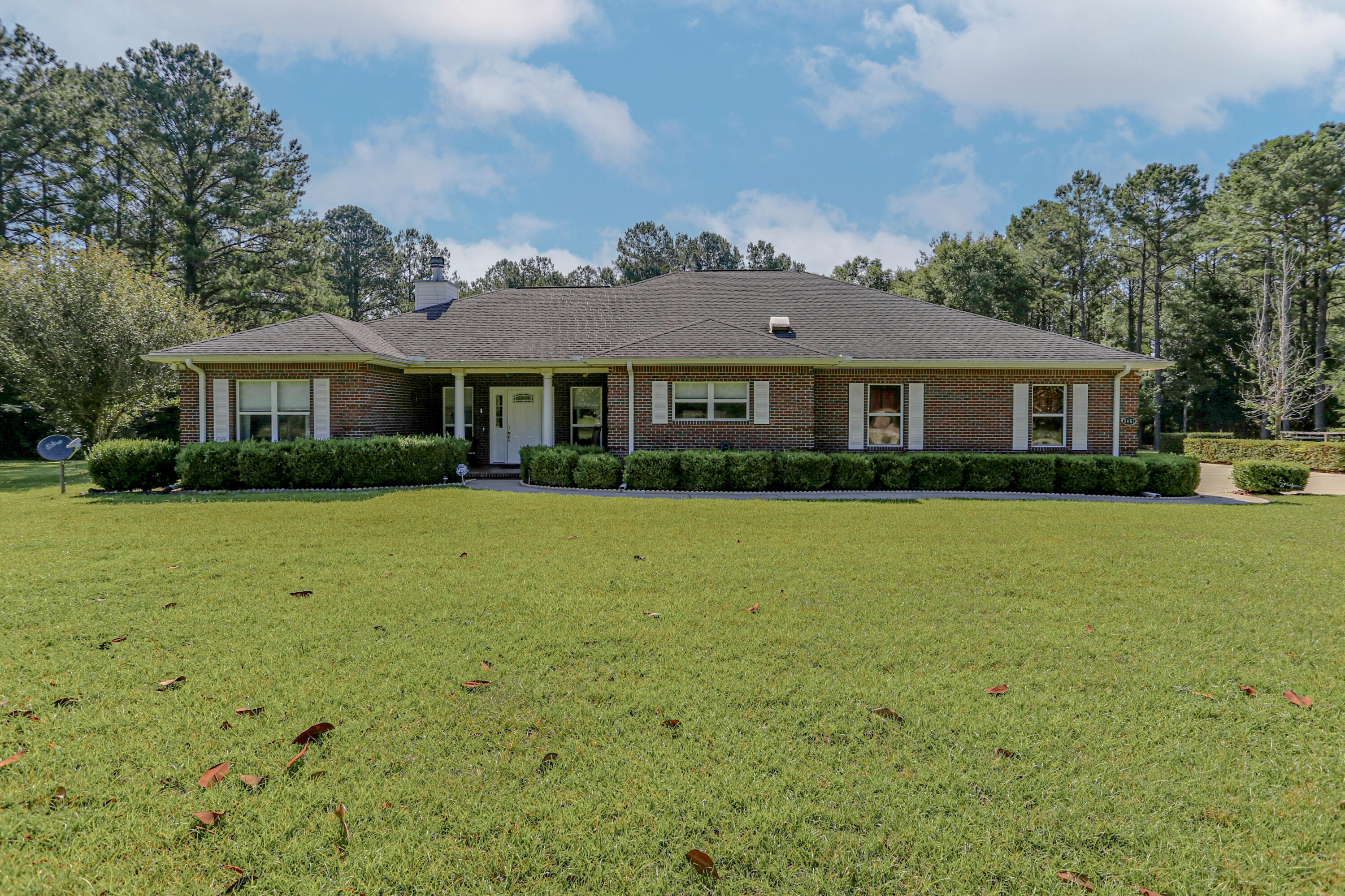 Come experience the peace and quiet of this well maintained home with enclosed pool situated on 2 acres in Baker with convenient access to Crestview.  The homes' layout is perfect for entertaining friends and family alike with large chefs kitchen and dining area, large family room accented with a fireplace with access to large (approx 450 sqft separately heated and cooled) enclosed porch overlooking the in-ground pool with integrated hot tub.  The chefs kitchen includes gas cooktop, in wall double oven, large island and an abundance of cabinetry, prep space, and pantry.  The master suite provides ample space to accommodate large furniture with space for a sitting area, large walk in closet, and a walk in shower (with new shower door to be installed).  The home features a split bedroom