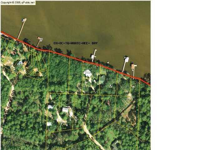 This lot has l25 ft on the bay with seawall in place Very nice, beautiful level lot with many old oak and magnolia trees.Chat Holly is in the process of being repaved along with a walking-bike path added. Listing agent is related to the seller.