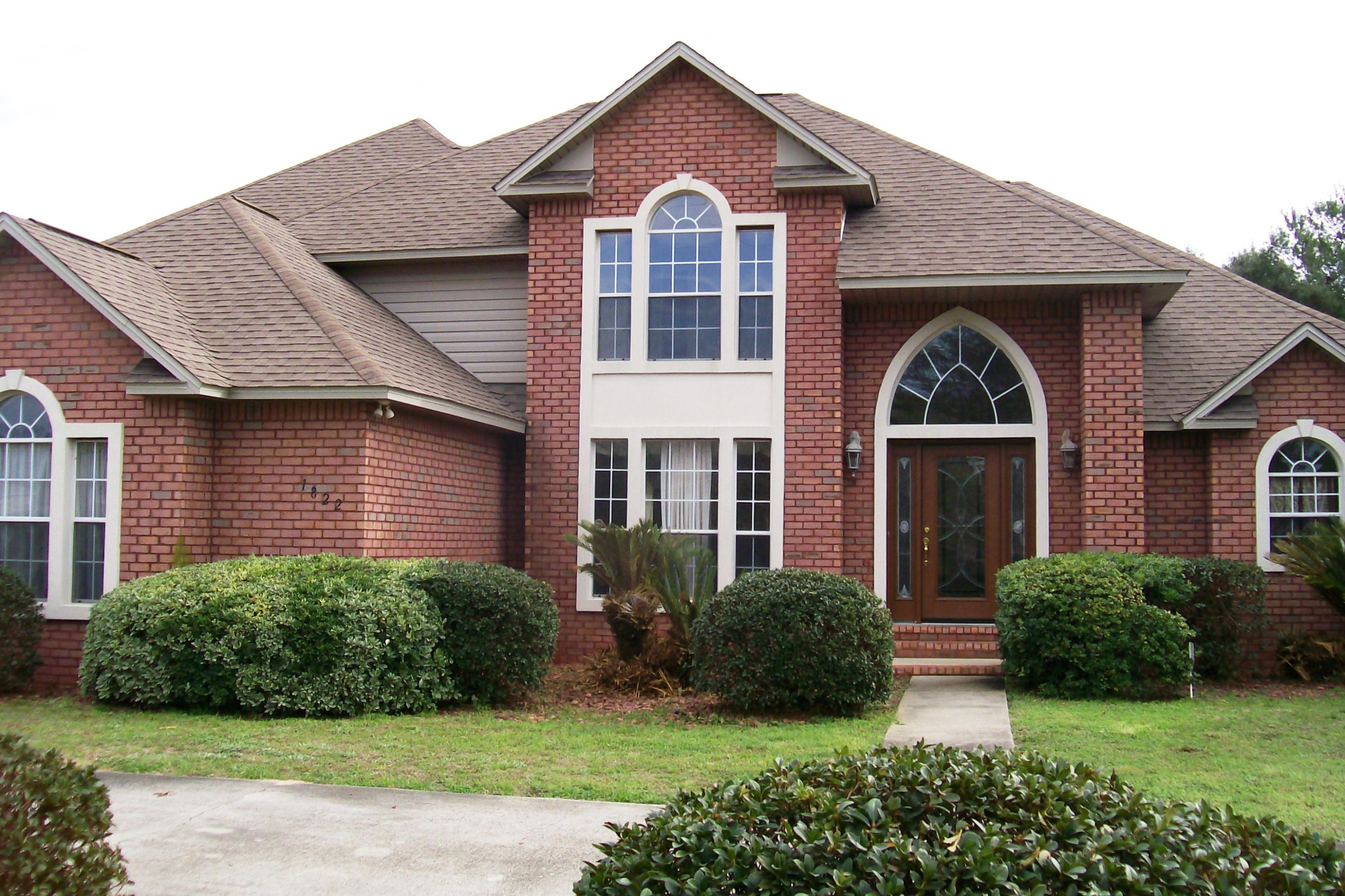 Seller will pay $5000 Buyer Closing Costs w/full offer. Stunning 2story brick home newly painted interior! This home was featured Showcase Home-Tremendous curb appeal. From the beautiful front door you will be delighted with professionally installed, low maintenance marble stained concrete floors in the living areas. The large living room was fantastic for entertaining with an elevated ceiling, ceiling fan & fireplace with mirror-great for decorations. Kitchen offers granite countertops, refinished cabinets, center island, tile flooring & built-in microwave. First floor master bedroom is accented with trey ceiling, featuring dbl. vanity, garden tub, separate shower,2 walk-in closets. At the top of the stairs is a 2nd Master BR,plus 2 BRs w/wood flooring, & 3rd bath. New gutters &lawn pump.