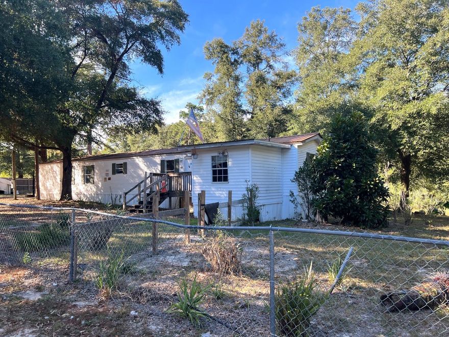 Investor special! This fixer-upper on almost one acre would make a great rental...or put some sweat equity and make it your home! Home is in need of repairs but sits on almost 1 acre. This home will need a cash buyer.
