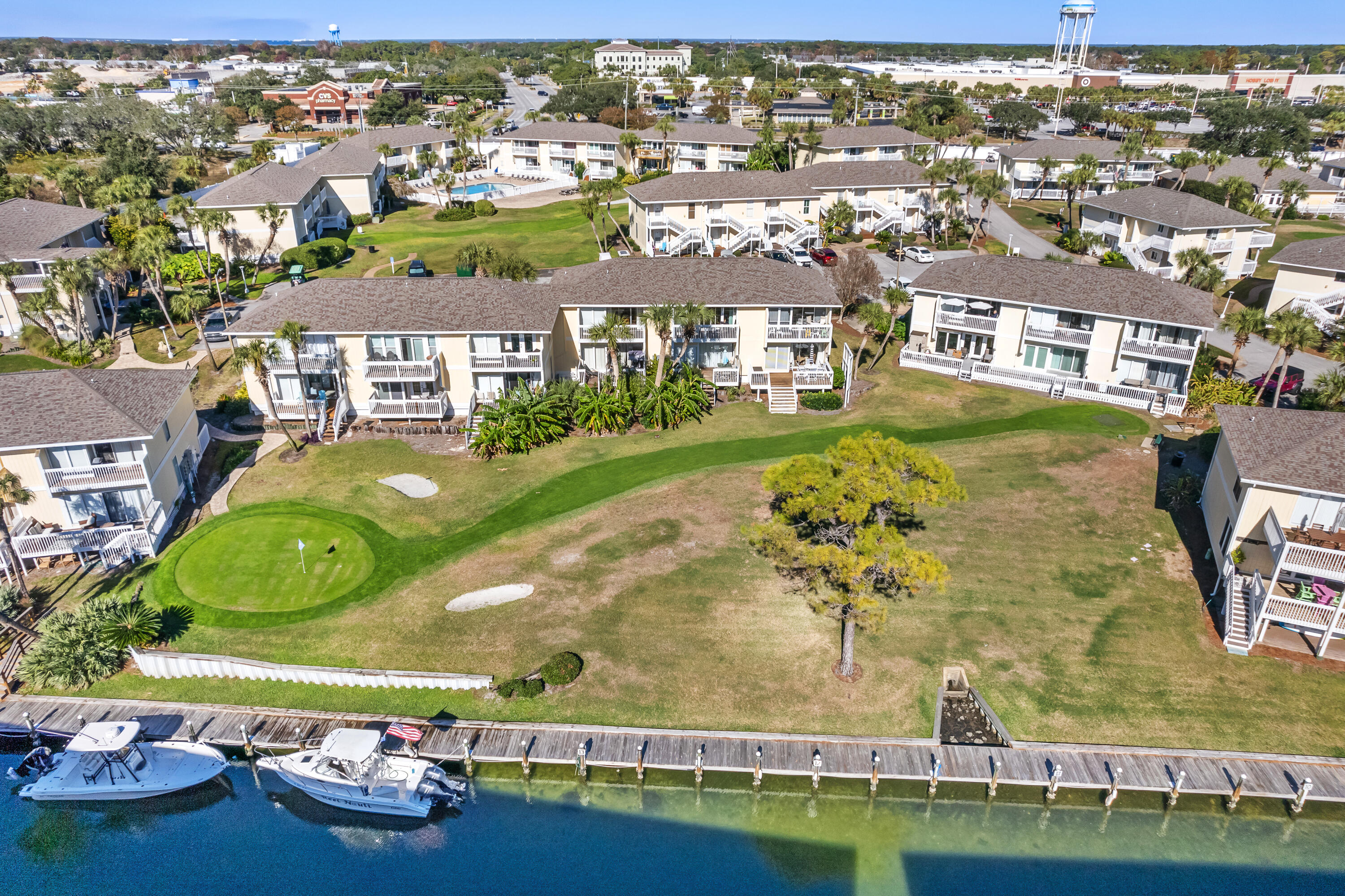 Charming, cozy and canal front!! Unit is under contract but accepting back-up offers until contingencies have been met! This is your chance to snatch up one of the best kept condos in Destin! Being located in the heart of Destin, you can walk, golf cart or bike ride to Target, local restaurants and coffee spots! Like to boat? Perfect! Temporary rental slips available through the HOA allows you to dock right outside the unit! Makes for a day on the boat easy when you can load all your picnic goodies and fishing poles with ease! Enjoy countless hours on the putting green right off the EXTENDED back porch! Once inside the unit it's obvious it was outfitted as a second home-with amenities that make the condo feel like home!
In the kitchen you will find new appliances such as a Bosch dishwasher, full sized refrigerator and a stove that also has an air fry option! Some other upgrades include a full-sized washer and dryer, no popcorn ceilings and built in owner storage inside and out! Unit being sold fully furnished!
Residential style resort occupying 43 acres in the heart of downtown Destin featuring 1100 ft deeded beachfront and seasonal beach rental service. Amenities include grill area, 5 pools, 6 tennis courts, canal docking by reservation & availability, marina for long term slip leasing(upon availability) and the onsite restaurant-Louisiana Lagniappe! Owning in Sandpiper Cove is a lifestyle you can't live without!